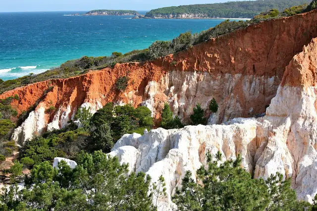The red and white eroded cliffs of the Pinnacles in Beowa National Park